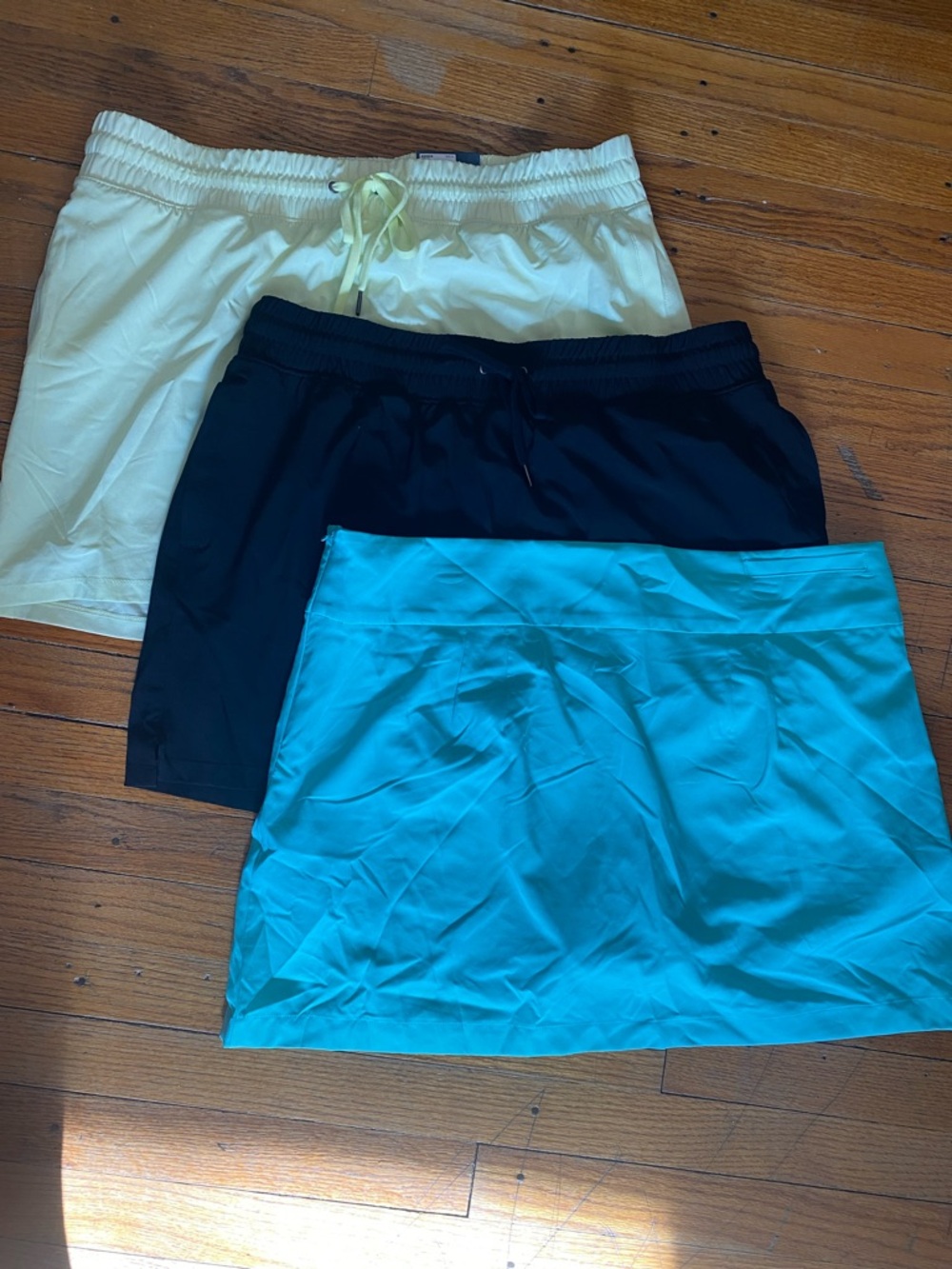 tek gear LOT of 3 - Black, yellow and teal Athletic Skirts.